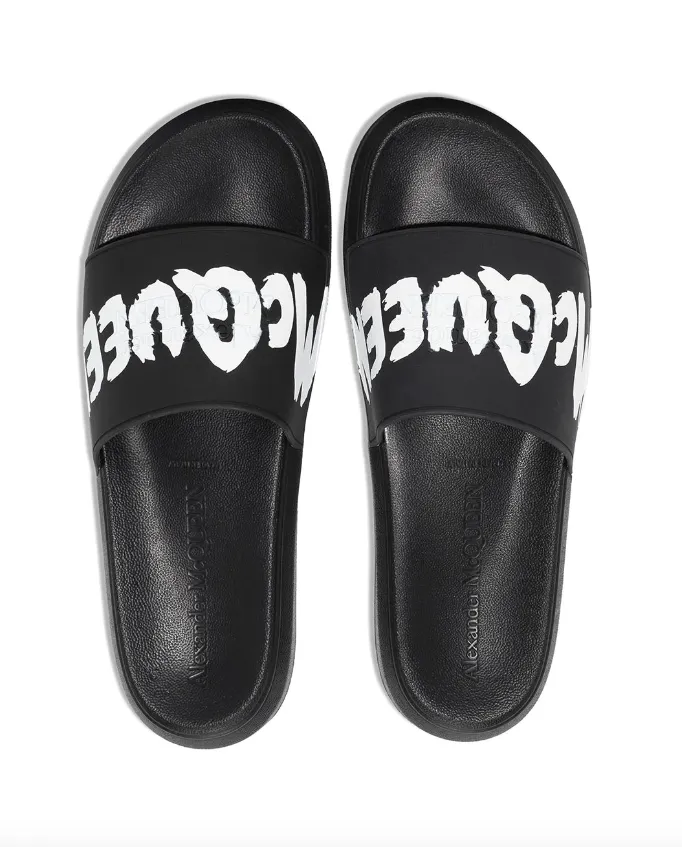 Alexander McQueen graffiti-logo slip-on slides Sandals With Bows